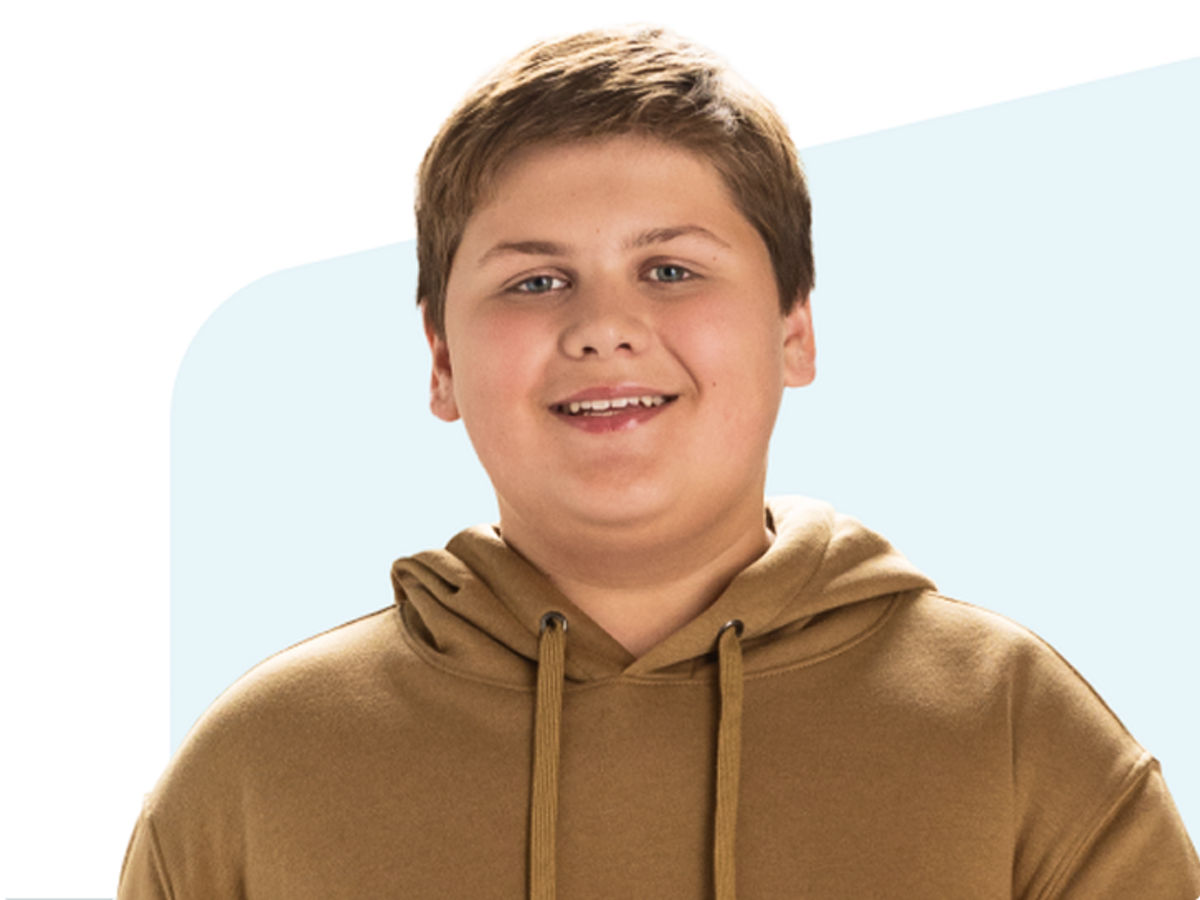 Teenager smiling at the camera